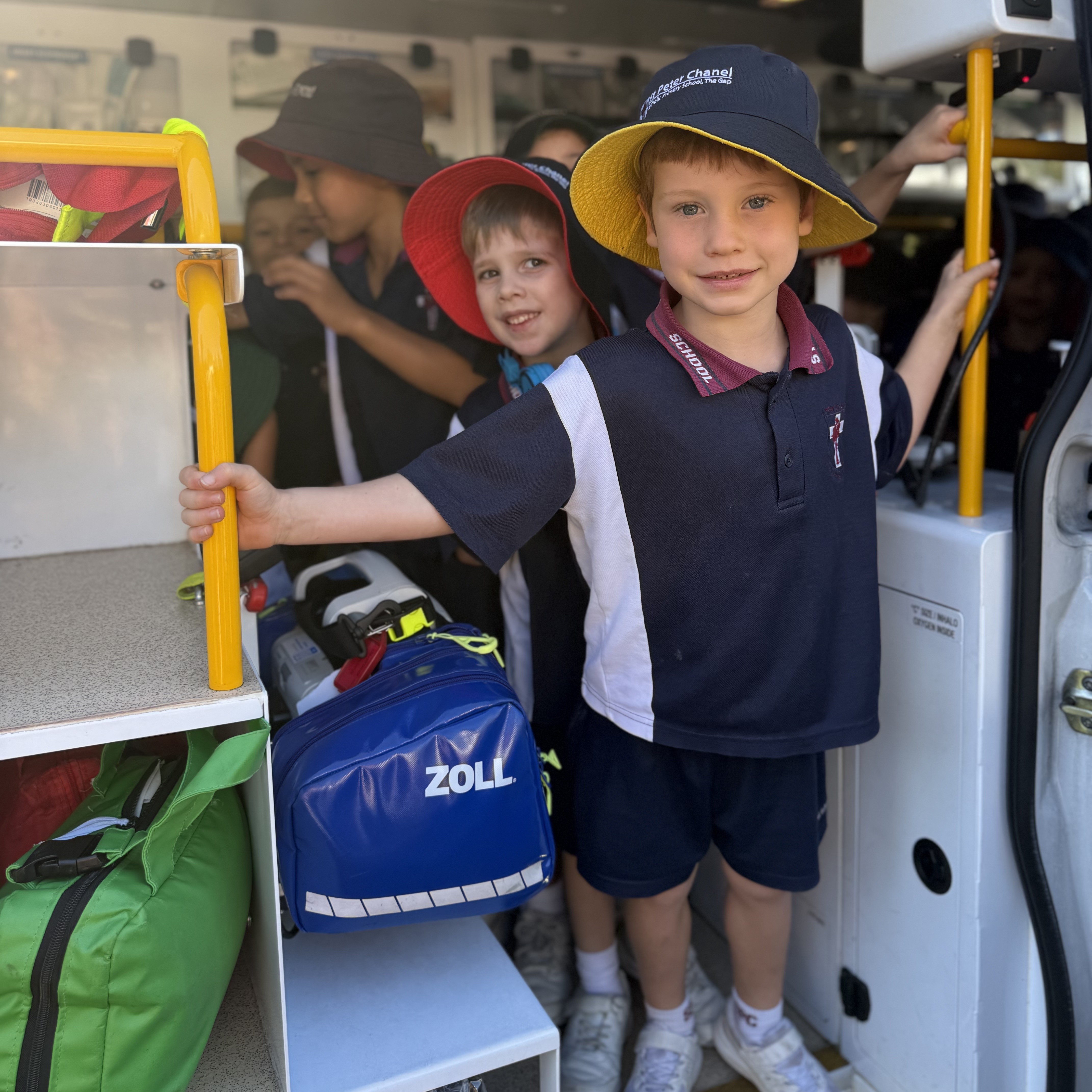 Students exploring an ambulance
